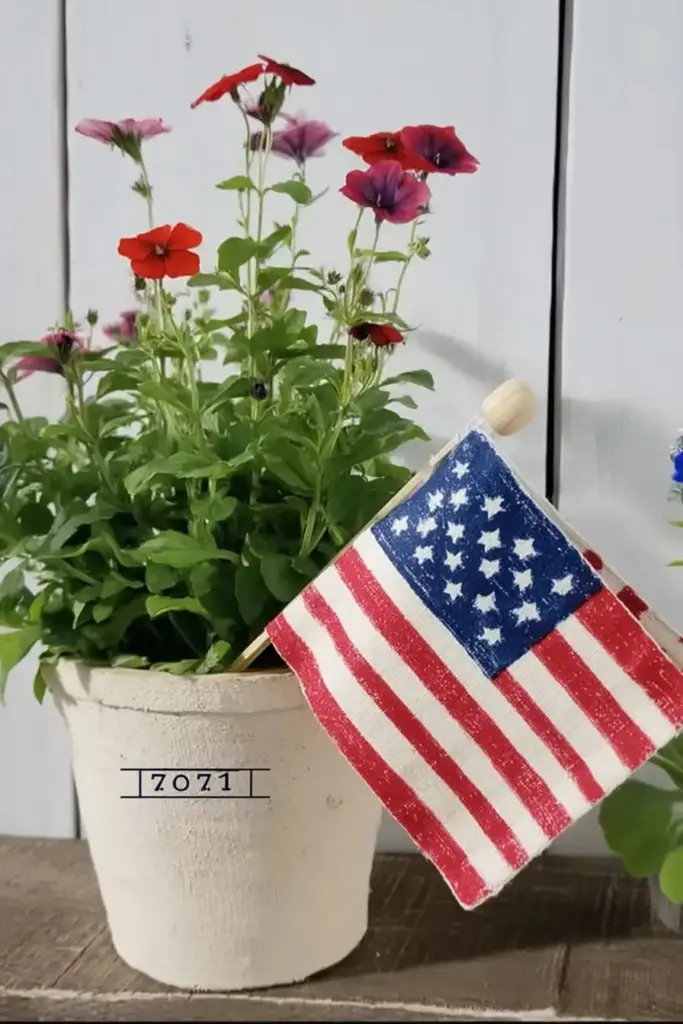 9. Add Mini Flags to Planters